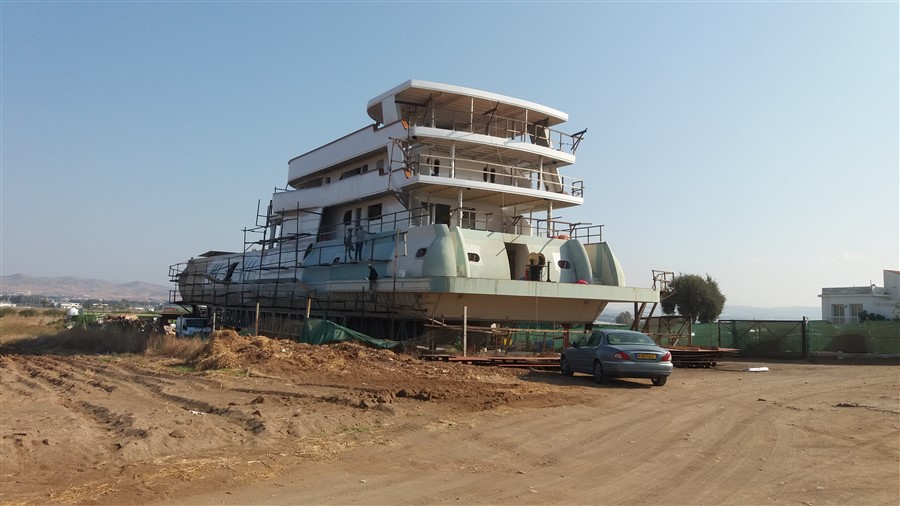 painting new boat at Timi beach (900 x 506).jpg